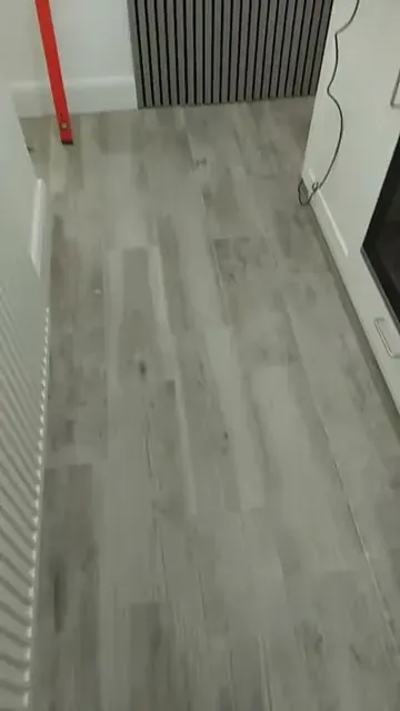 Grey wood-effect flooring in a kitchen