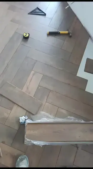 Herringbone floor fitting at a doorway