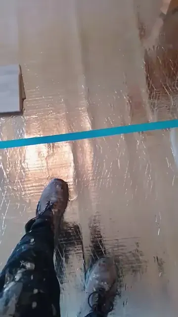Flooring underlay being fitted at a doorway