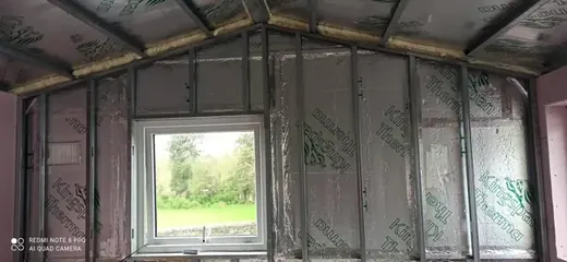 Roof and wall framing around a window opening