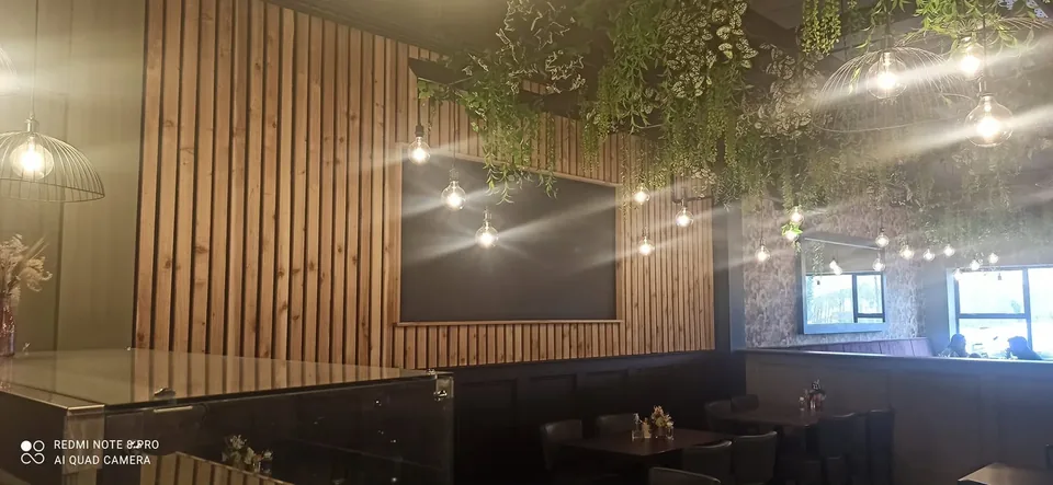Finished timber slat feature wall in a warmly lit interior