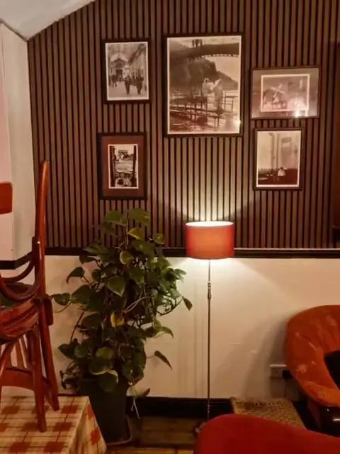 Finished vertical wall panelling and trim